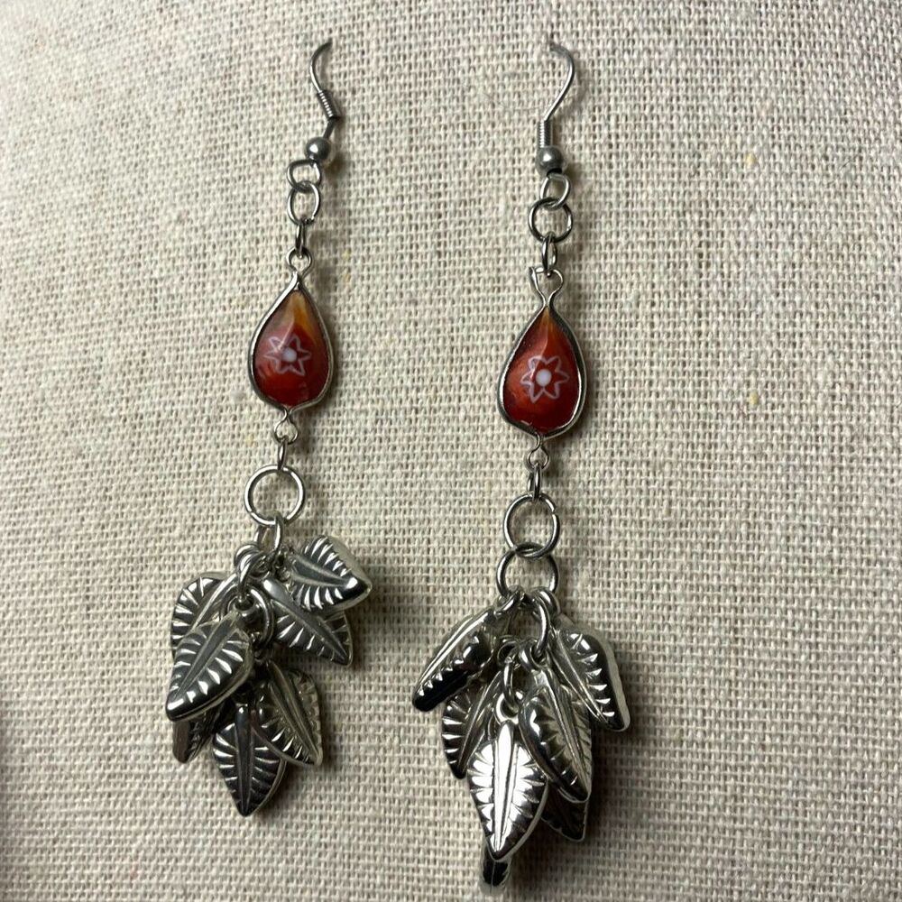 Silver leaf earrings with red stones